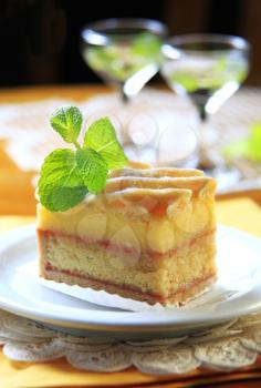 Slice of liquor soaked cake with lattice topping