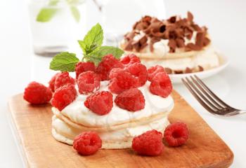Pancakes with sweet creamy cheese and fresh raspberries