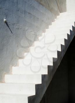Outside stairs at  concrete wall