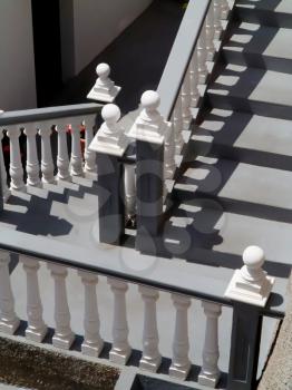 Staircase with white and gray balustrade