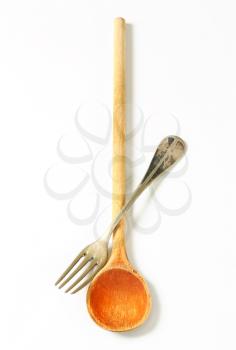 Wooden spoon and metal fork