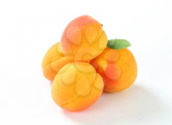 Fresh apricots isolated on white