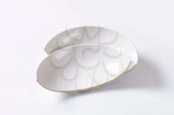 White porcelain bowl broken in half