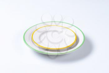 Dinner plate and side plate with colored edges