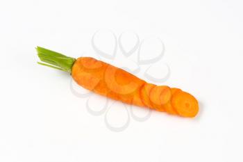 sliced fresh carrot on white background
