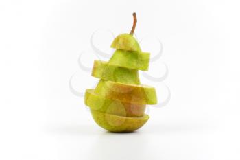 sliced ripe pear on white background