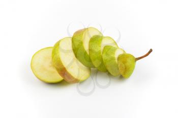 sliced ripe pear on white background