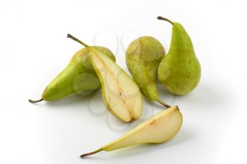 three whole pears, half a pear and slice