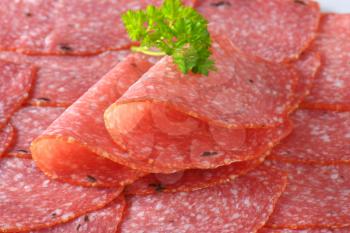 thin slices of spicy salami - close up