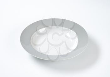 Soup plate with wide grey rim