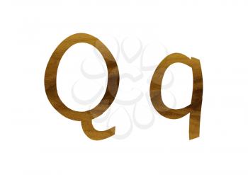 One letter from teak veneer alphabet: the letter Q