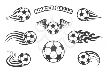 Footballs or soccer balls with wings, fire and various motion trails. Isolated on white.