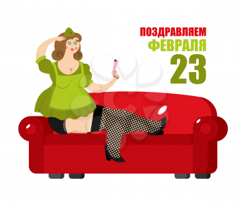 Beautiful girl in soldiers uniform is sitting on red couch. Russian text: on 23 February. Defenders of Fatherland Day. Military holiday in Russia
