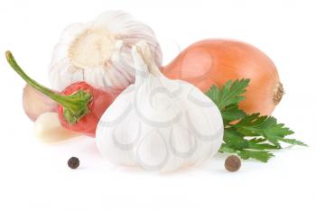 garlic and vegetables with food spices isolated on white background