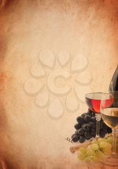 wine in glass and grape fruit on old paper parchment background