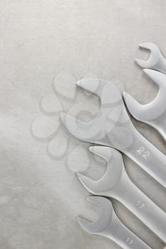 wrench tool on metal background texture