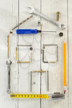 tools and instruments on wooden background