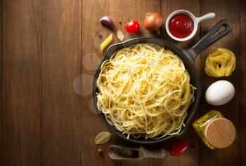 ready pasta  on wooden background