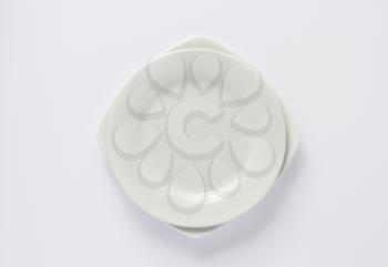 empty plate on white  background, top view