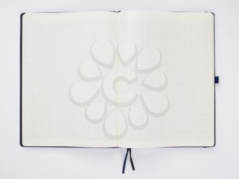 checked notebook at white background
