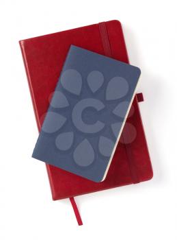 closed notebook or notepad at white background, top view