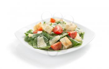 caesar salad in plate isolated on white background