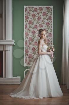 The model advertises a wedding dress.