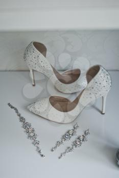 The brides shoes before the wedding.