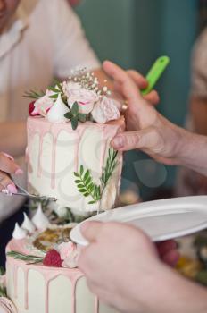 The process of serving guests cake at the wedding.