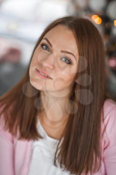 Large portrait of a girl with long hair.