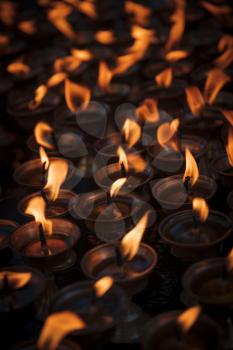 Candles in Swayambhunath temple in Kathmandu, Nepal