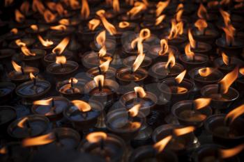 Candles in Swayambhunath temple in Kathmandu, Nepal
