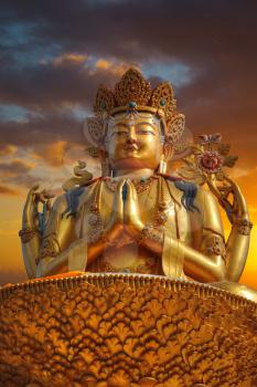 golden statue of Chenrezig stands in Kathmandu. Nepal