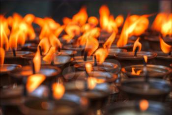 Kathmandu candles burn for religious purposes. Nepal