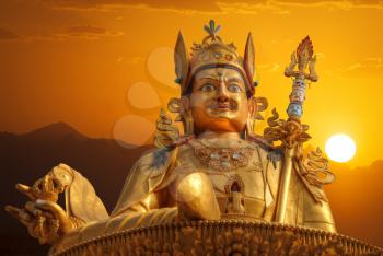 Gold Guru Rinpoche statue stands in Kathmandu. Nepal