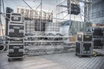 Preparing an open-air stage for a concert