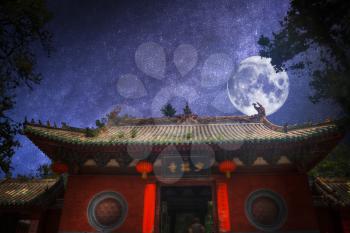 Shaolin is a Buddhist monastery in central China. At night the moon and stars shine.