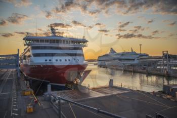 at dawn the cruise liner is preparing to leave from the port of Tallinn