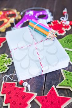 envelopes and christmas decoration on the wooden table