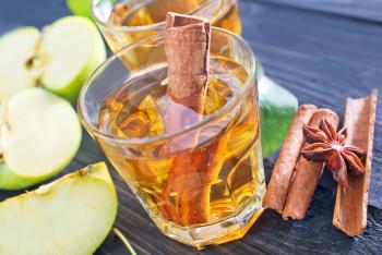 apple cider with cinnamon in the glass