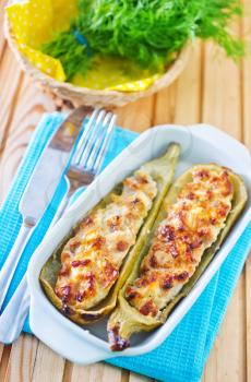stuffed marrow with meat and cheese in the bowl