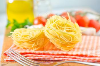 raw pasta and tomato
