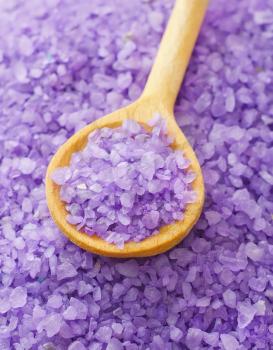 Violet sea salt for spa in wooden board