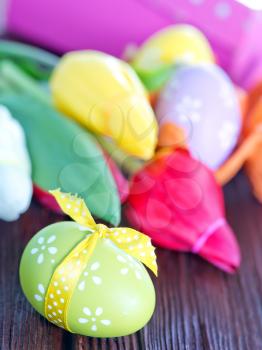 easter eggs and box for present on a table