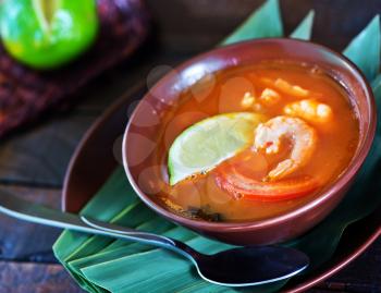 tom yam soup in the brown bowl