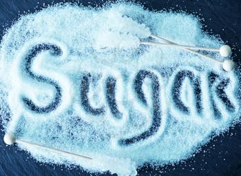 text on white sugar, sugar on the table