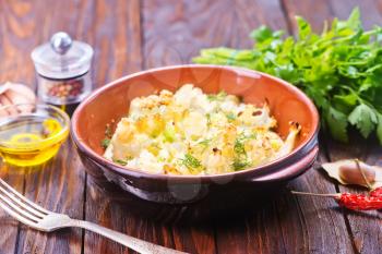 cauliflower baked with egg in the bowl