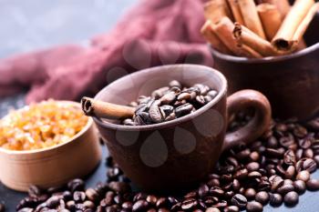 coffee beans in cup and on a table