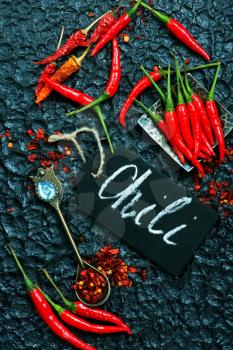 chili peppers on the black table
