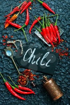 chili peppers on the black table